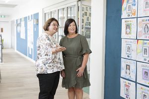 St Pius Catholic Primary School Enmore - Principal and teacher at the school hallway